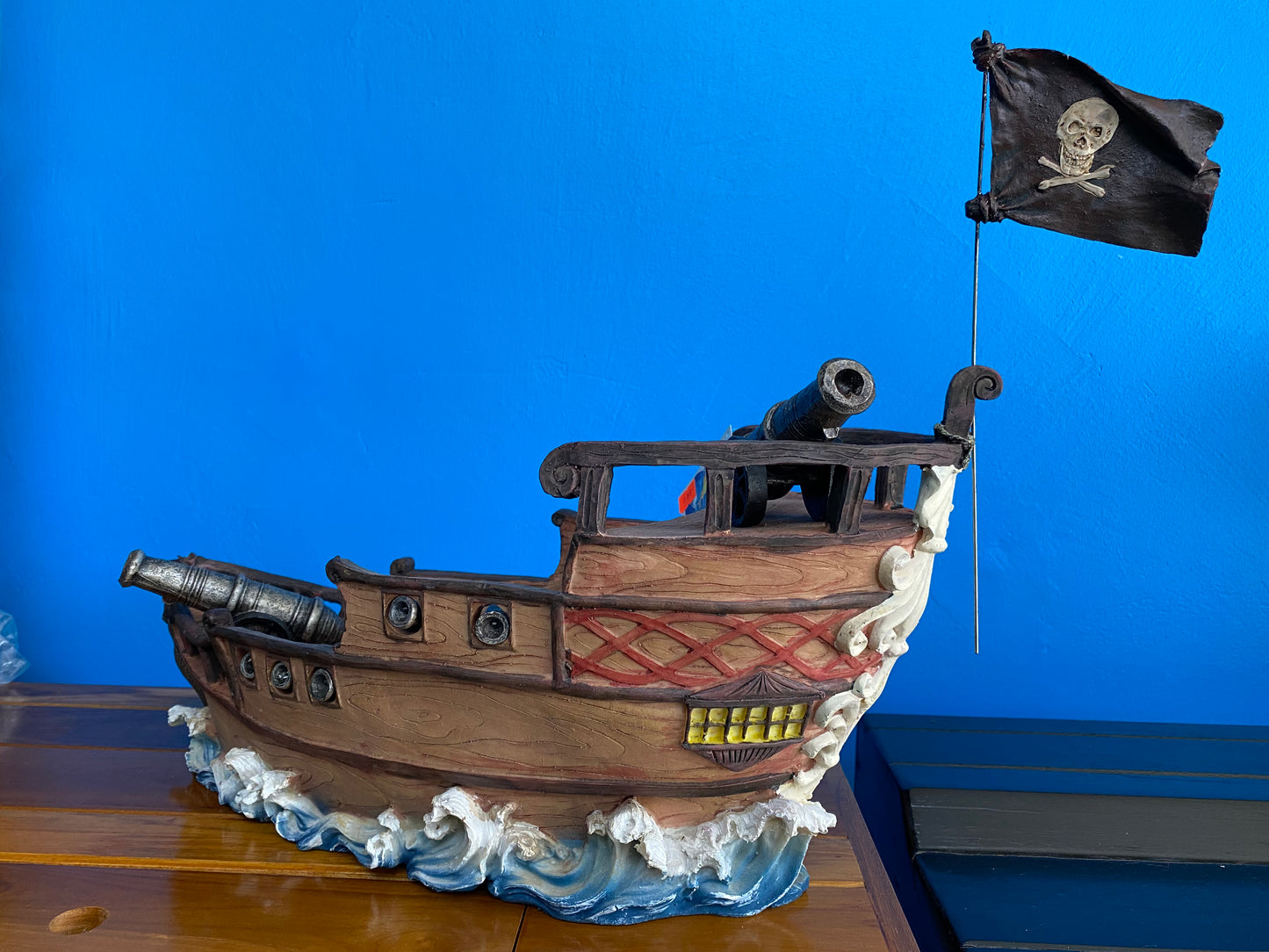 Pirate Ship on Wave with Cannons
