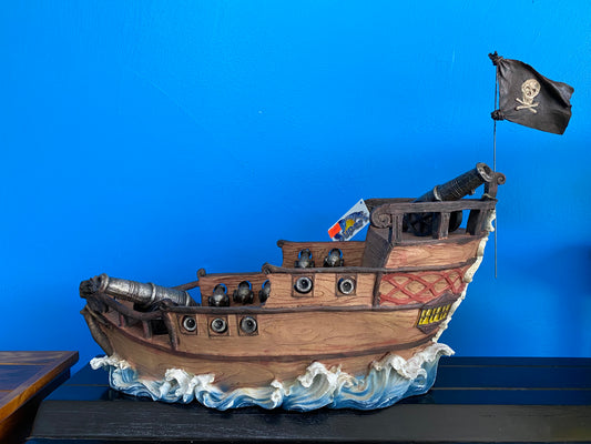 Pirate Ship on Wave with Cannons